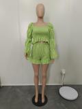 Sexy women's blouse with piled sleeves and pleated suit