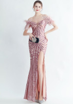 Positioning sequin feather straps off shoulder formal party evening dress
