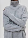Women loose turtleneck sweater