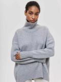 Women loose turtleneck sweater