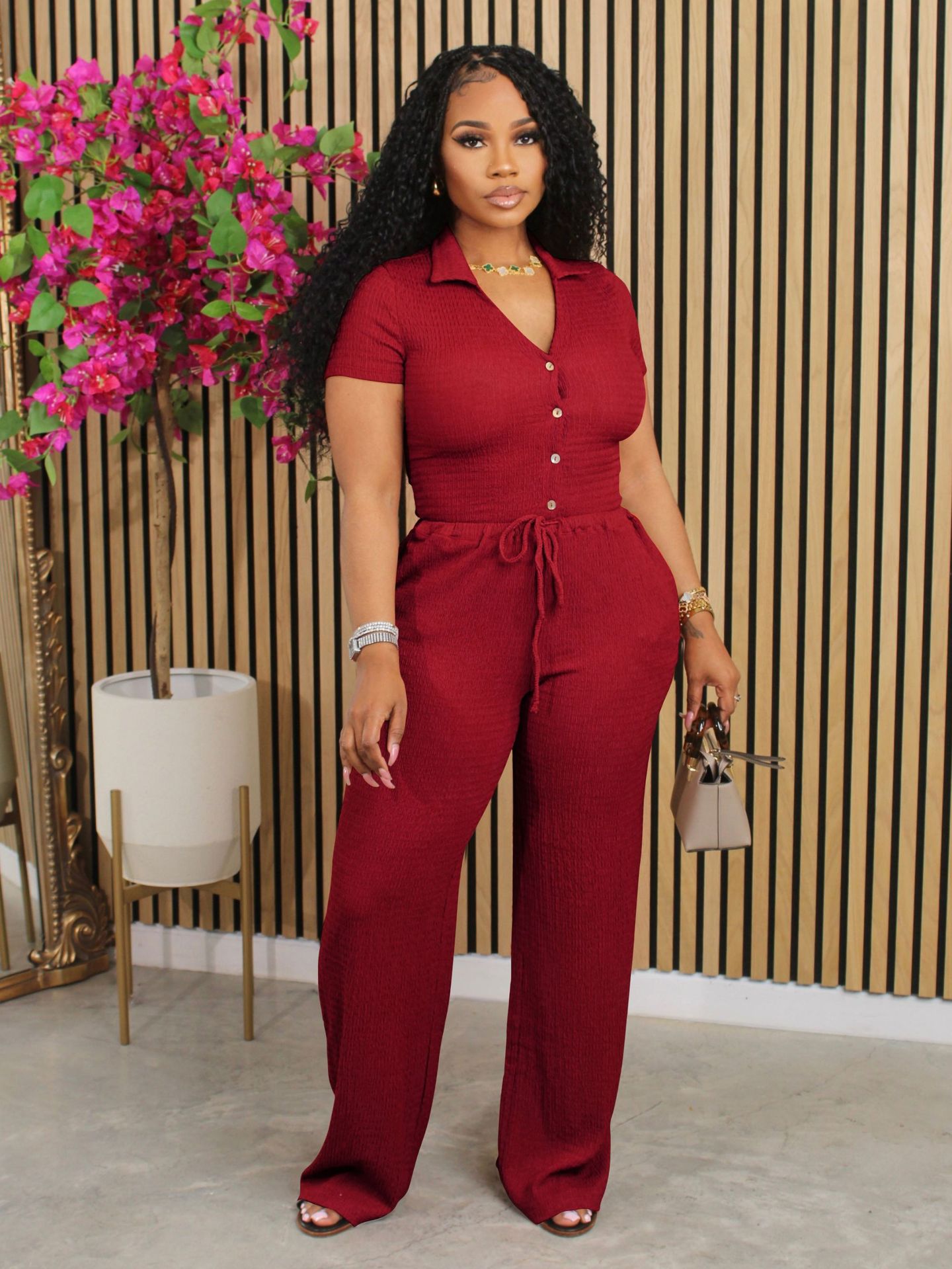 Women short-sleeved loose pleated v-neck shirt and trousers two-piece set