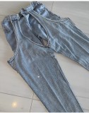 Fashion Irregular hollow Patchwork zipper Beaded elastic Denim pants