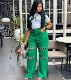 Women's High-Waisted Patchwork Denim Jeans with Studded Chain