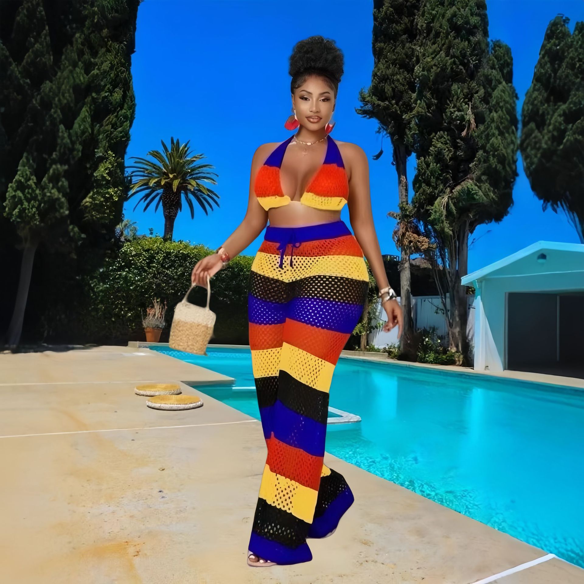 Women multi-color striped halter neck backless top and knitting pant, sexy see-through mesh two-piece set.