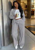African Women long-sleeved striped shirt and contrasting wide-leg pants casual two-piece set African Women long-sleeved striped shirt and contrasting wide-leg pants casual two-piece set