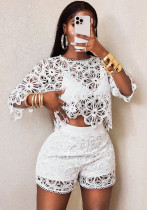 Women hollow crocheted short-sleeved round neck top and sexy see-through shorts two-piece set