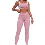 Women contrasting backless sports vest and yoga culottes