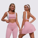 Women contrasting backless sports vest and yoga culottes