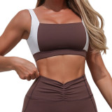 Women contrasting backless sports vest and yoga culottes