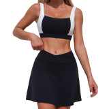 Women contrasting backless sports vest and yoga culottes