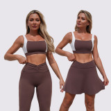 Women contrasting backless sports vest and yoga culottes