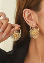 Women gold hollow petal earrings