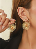 Women gold hollow petal earrings