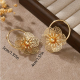 Women gold hollow petal earrings
