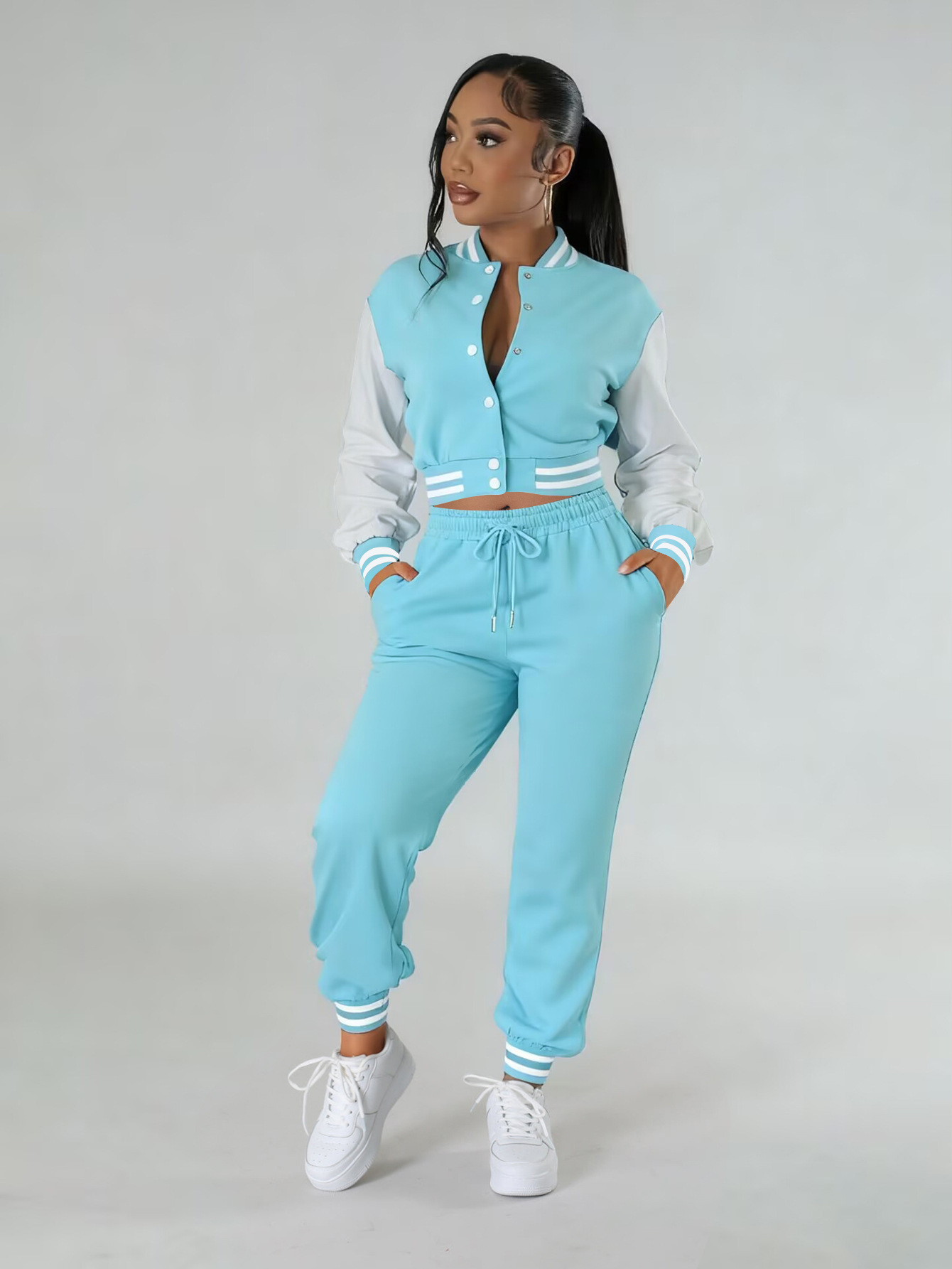 Women contrasting color baseball top and pant two-piece set