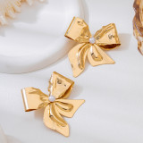 Women's Pair of Elegant Bow-Shaped Gold Metal Earrings