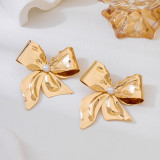 Women's Pair of Elegant Bow-Shaped Gold Metal Earrings