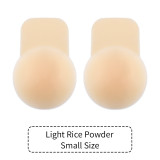 Women lifting breast pads with invisible silicone nipple covers