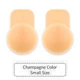 Women lifting breast pads with invisible silicone nipple covers