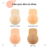 Women lifting breast pads with invisible silicone nipple covers