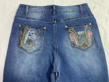 Women American Embroidered Floral Washed Denim Bell Bottom Pants