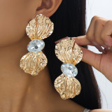 Women elegant gold diamond-encrusted metal stud earrings