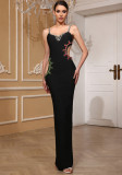 Women black camisole with asymmetrical red and green gemstone slit backless bandage Maxi Dress