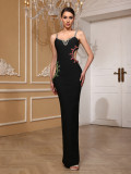 Women black camisole with asymmetrical red and green gemstone slit backless bandage Maxi Dress