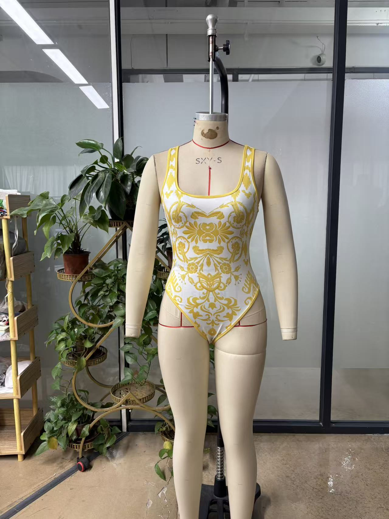 Printed Tight Fitting Low Back One-Piece Bodysuit