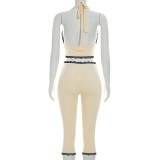 Women Halter Neck Lace-Up Backless Tie-Waist Solid Top and Three-Quarter Pant Two-Piece Set