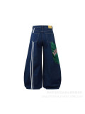 Women Barrel-Leg Denim Pants with Jersey-Style Patches and Graffiti Print