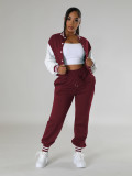 Women contrasting color baseball top and pant two-piece set