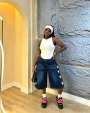 Women star-embroidered denim capri pants
