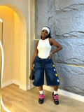 Women star-embroidered denim capri pants
