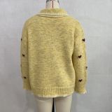 Women's Turndown Collar Heart Print Jacquard Knit Color Block Pearl Button Sweater