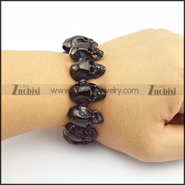 Black Stainless Steel Skull Bangle with 10 Skull Heads b005969