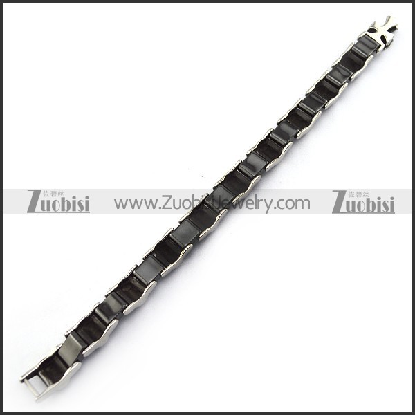 Black Ceramic Bracelet with Stainless Skulls b005607