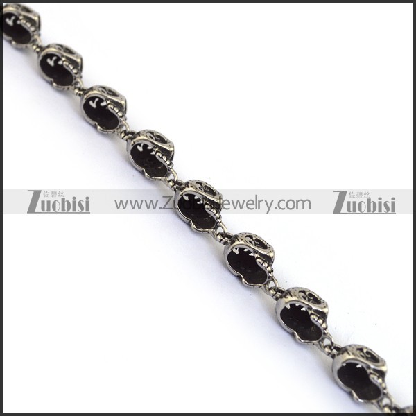12 cut-out skull heads bracelets for ladies b002779