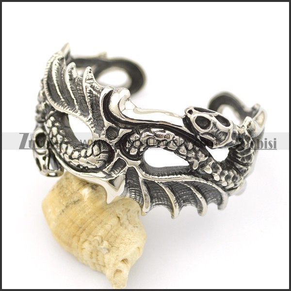 dragon and snake heads on both ends of bangle b002506