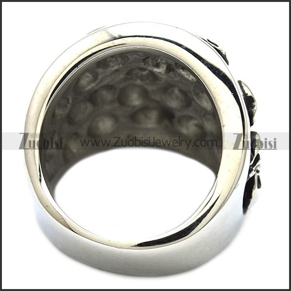 heavy ring with numerous small skull heads r001144