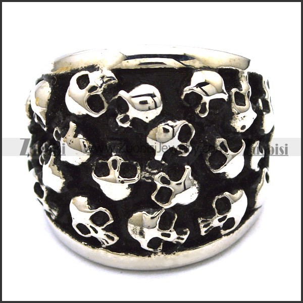 heavy ring with numerous small skull heads r001144