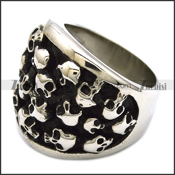 heavy ring with numerous small skull heads r001144