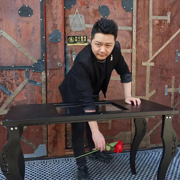 * Hand Through Glass Table