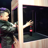 * Hand Through Glass Cabinet