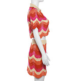 WHOLESALE | Warm Colors Knitted Wave Hem Skirt Set in Orange