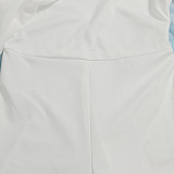 SUPER WHOLESALE | ONE SHOULDER SINGLE LONG SLEEVE RUFFLED TRIM CAPE STRAIGHT LEG WHITE JUMPSUIT IN WHITE