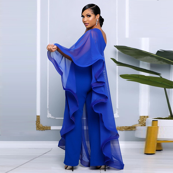 SUPER WHOLESALE | ONE SHOULDER SINGLE LONG SLEEVE RUFFLED TRIM CAPE STRAIGHT LEG WHITE JUMPSUIT IN BLUE