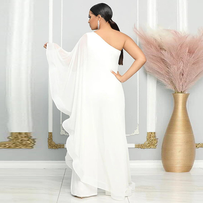 SUPER WHOLESALE | ONE SHOULDER SINGLE LONG SLEEVE RUFFLED TRIM CAPE STRAIGHT LEG WHITE JUMPSUIT IN WHITE