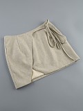 SUPER WHOLESALE |   Hollow-Out Long-Sleeve Top and Asymmetrical Tie Skirt Two-Piece Set