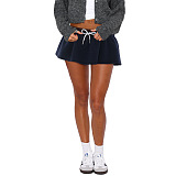 SUPER WHOLESALE | Solid Color Low-Waist Tie Strap Mini Skirt